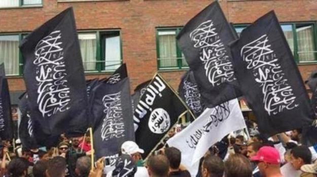 The protests marks the first time the ISIS black flags have been flown in Europe Frank Verhoef